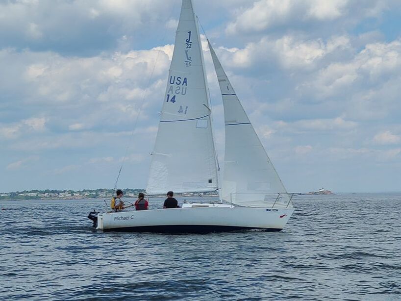 Sailors aboard an AYC J/22
